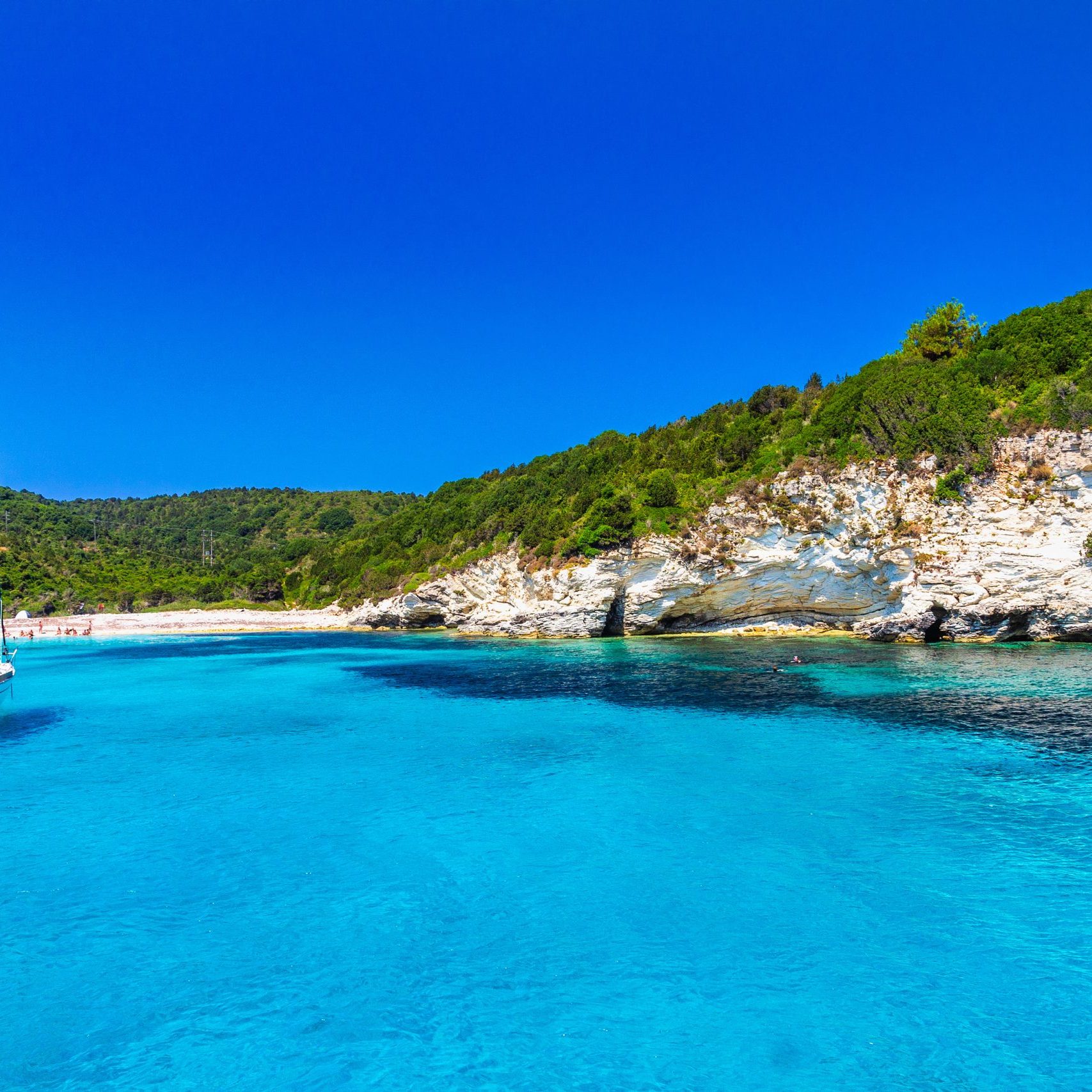 Turquoise coast of Antipaxos island near Corfu with Voutoumi beach, Greece, Europe.